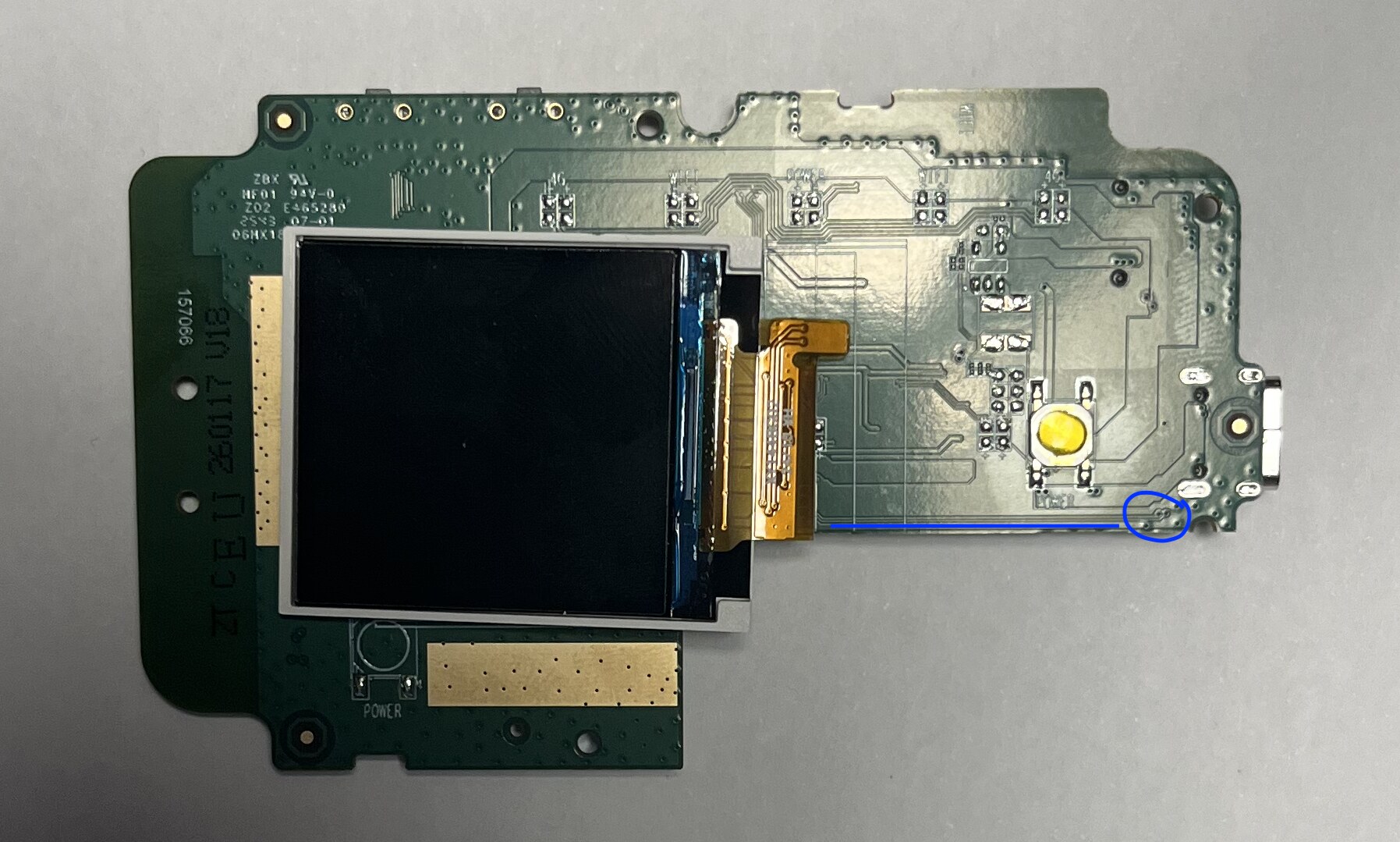 Top, with a the blue lines showing the USB data lines going from the connector and pads to the SOC